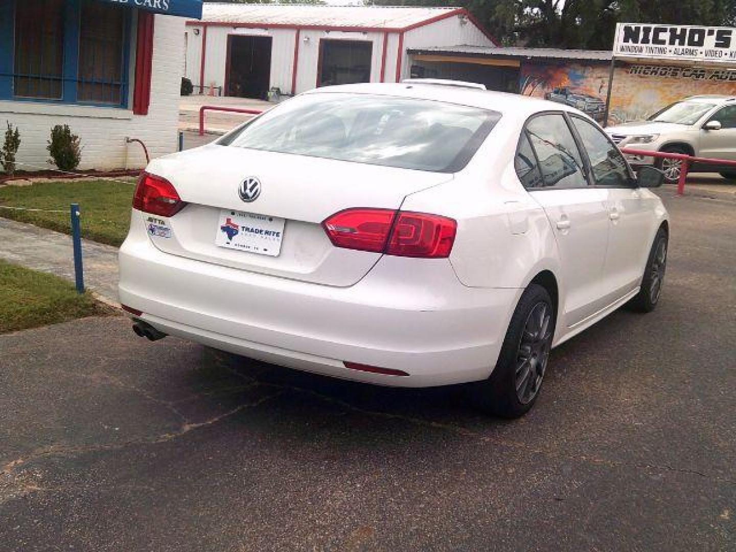 2013 Candy White /Titan Black Volkswagen Jetta S (3VW2K7AJ2DM) with an 2.0L L4 DOHC 16V engine, located at 116 N. Frazier Street, Conroe, TX, 77301, (936) 647-0690, 30.308662, -95.460480 - Photo#5