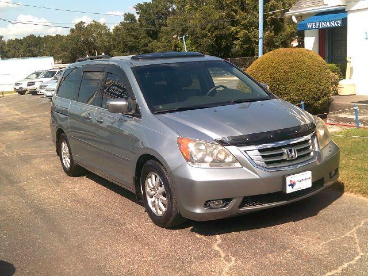 2009 Bali Blue Pearl /Gray Leather Interior Honda Odyssey EX-L w/ DVD (5FNRL38729B) with an 3.5L V6 SOHC 24V engine, 5-Speed Automatic transmission, located at 116 N. Frazier Street, Conroe, TX, 77301, (936) 647-0690, 30.308662, -95.460480 - Photo#1