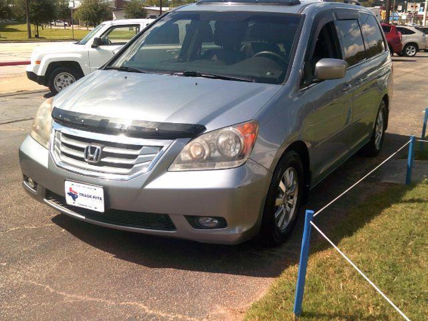 2009 Bali Blue Pearl /Gray Leather Interior Honda Odyssey EX-L w/ DVD (5FNRL38729B) with an 3.5L V6 SOHC 24V engine, 5-Speed Automatic transmission, located at 116 N. Frazier Street, Conroe, TX, 77301, (936) 647-0690, 30.308662, -95.460480 - Photo#2