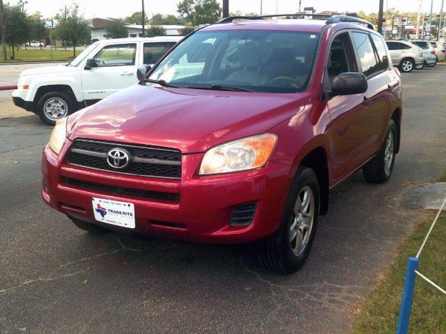 2010 Barcelona Red Metallic /Ash Cloth Interior Toyota RAV4 Base I4 2WD (JTMZF4DV8AD) with an 2.4L L4 DOHC 16V engine, 4-Speed Automatic transmission, located at 116 N. Frazier Street, Conroe, TX, 77301, (936) 647-0690, 30.308662, -95.460480 - Photo#2