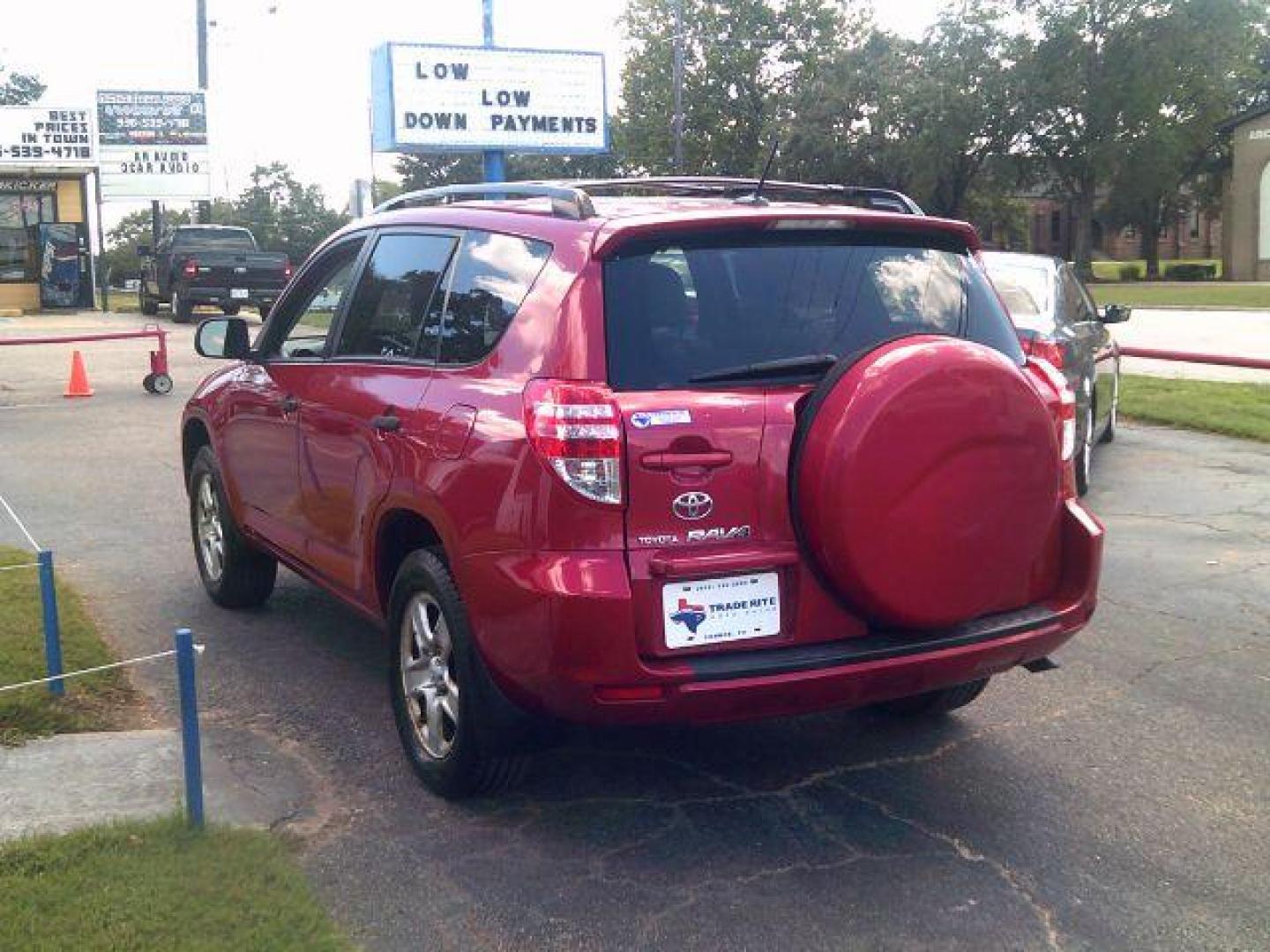 2010 Barcelona Red Metallic /Ash Cloth Interior Toyota RAV4 Base I4 2WD (JTMZF4DV8AD) with an 2.4L L4 DOHC 16V engine, 4-Speed Automatic transmission, located at 116 N. Frazier Street, Conroe, TX, 77301, (936) 647-0690, 30.308662, -95.460480 - Photo#4