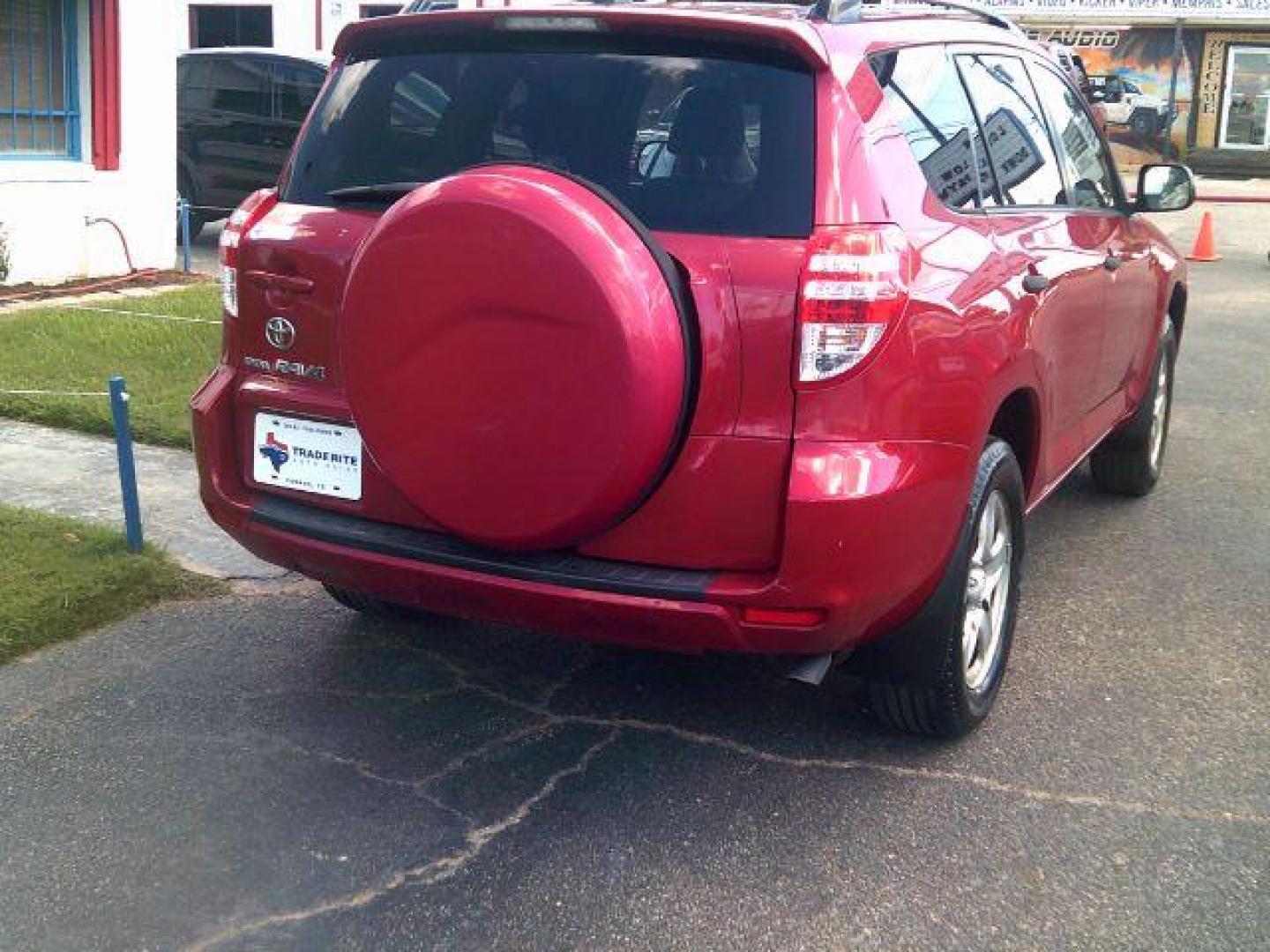 2010 Barcelona Red Metallic /Ash Cloth Interior Toyota RAV4 Base I4 2WD (JTMZF4DV8AD) with an 2.4L L4 DOHC 16V engine, 4-Speed Automatic transmission, located at 116 N. Frazier Street, Conroe, TX, 77301, (936) 647-0690, 30.308662, -95.460480 - Photo#5