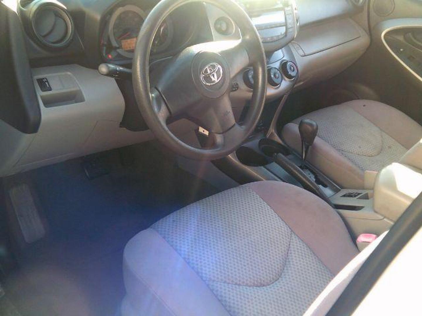 2007 Super White /Ash Cloth Interior Toyota RAV4 Base I4 2WD (JTMZD33V076) with an 2.4L L4 DOHC 16V engine, 4-Speed Automatic transmission, located at 116 N. Frazier Street, Conroe, TX, 77301, (936) 647-0690, 30.308662, -95.460480 - Photo#7